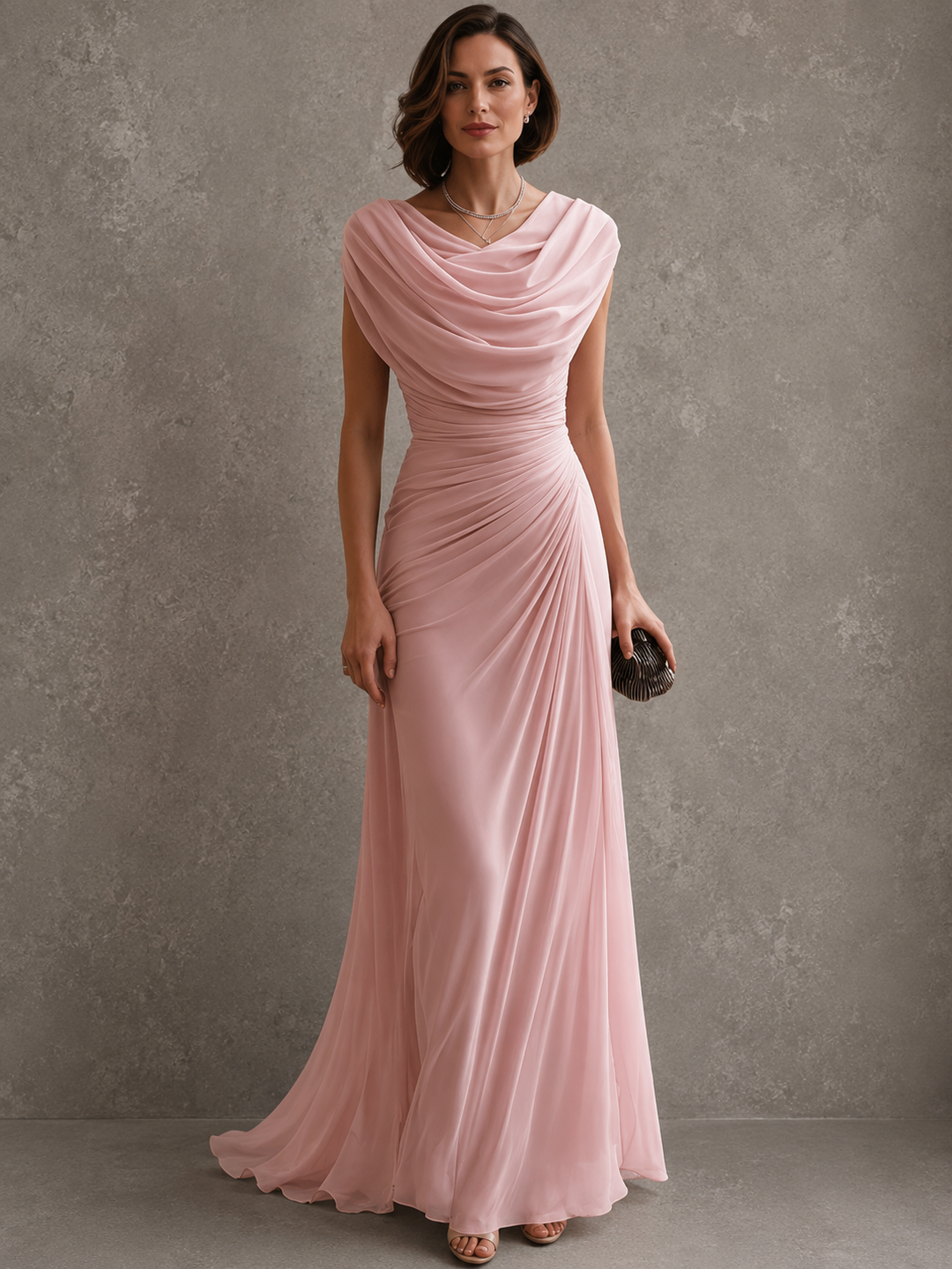 Woman wearing sleeveless draped maxi dress in full length