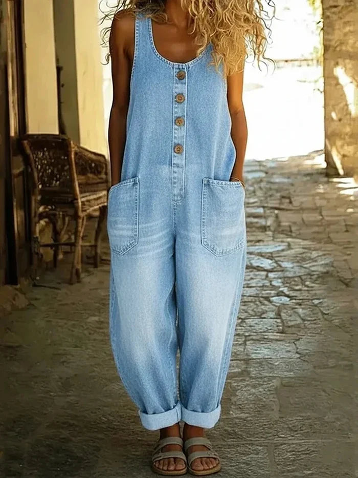 Woman wearing a wide leg jumpsuit with adjustable straps