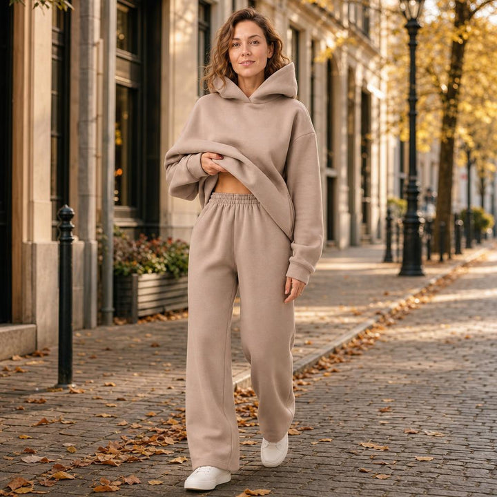 Woman wearing matching hooded knit tracksuit set – Lifestyle photo